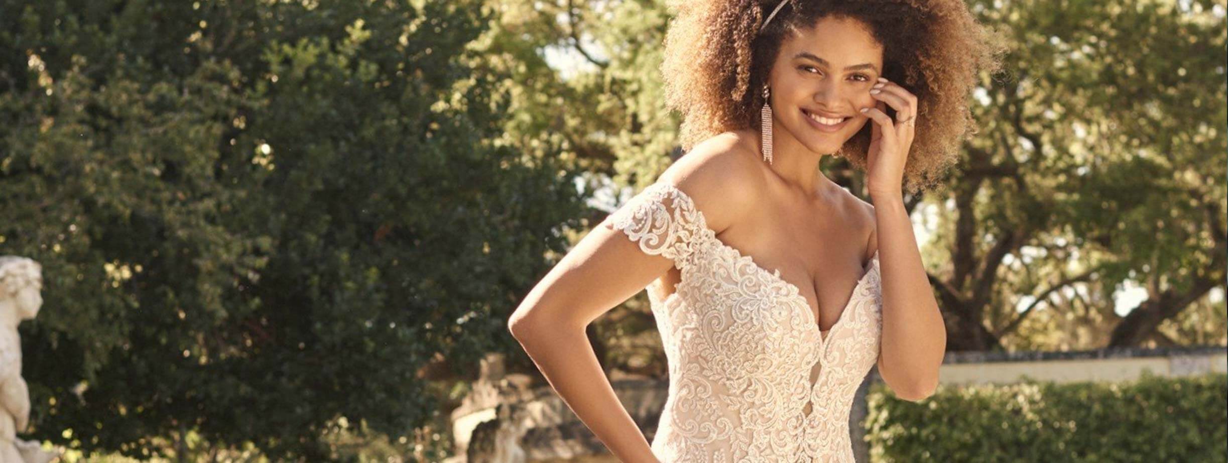 Model wearing a white gown